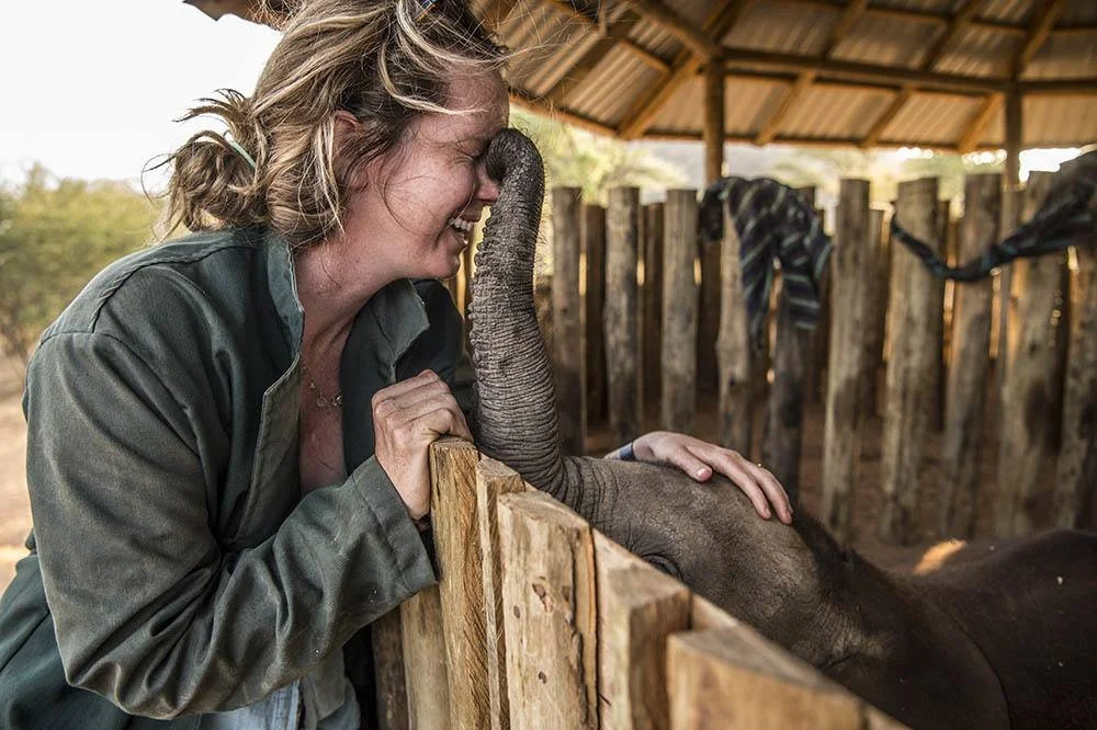 Katie Rowe at Reteti Elephant Sanctuary by Ami Vitale